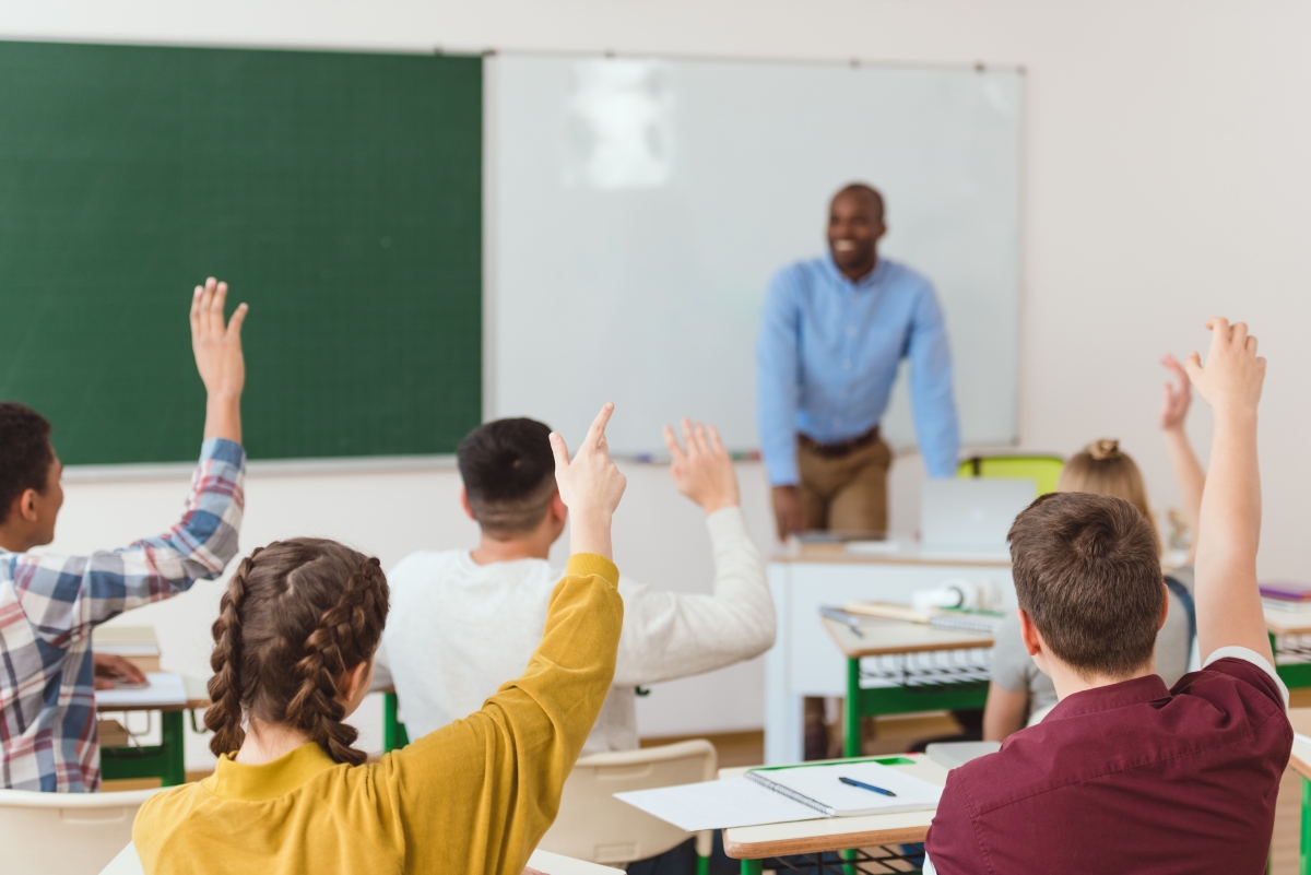 classroom with teacher and students